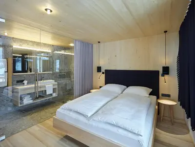 Ein Bett oder Betten in einem Zimmer der Unterkunft Tinn Naturchalet