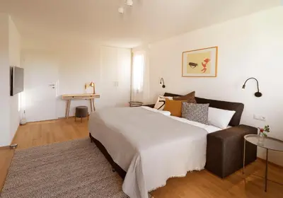 Ein Bett oder Betten in einem Zimmer der Unterkunft Haus4Zimmer - Luxus mit Blick über den Bodensee - mit Garage