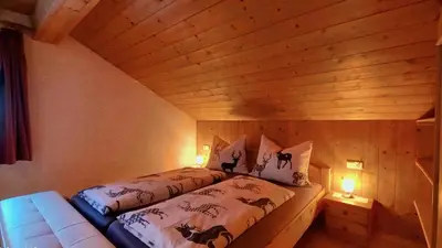 Ein Bett oder Betten in einem Zimmer der Unterkunft Haus Simma