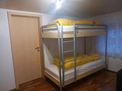 Ein Bett oder Betten in einem Zimmer der Unterkunft Ferienwohnung an der Alfenz