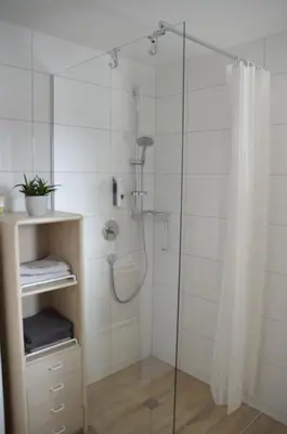Ein Badezimmer in der Unterkunft Apartments 