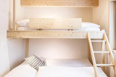 Ein Bett oder Betten in einem Zimmer der Unterkunft Haus im WALDner