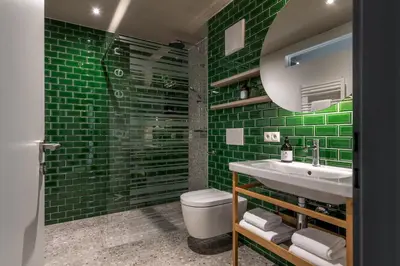 Ein Badezimmer in der Unterkunft Livingreen Residences