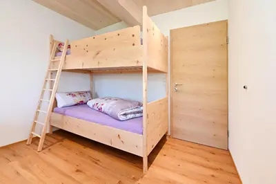 Ein Bett oder Betten in einem Zimmer der Unterkunft AuszeitHof Vögel