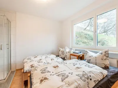 Ein Bett oder Betten in einem Zimmer der Unterkunft Ferienhaus Feldkirch mit Aussicht