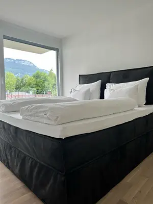 Ein Bett oder Betten in einem Zimmer der Unterkunft Village by Maier - kontaktloser Check-in
