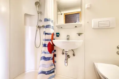 Ein Badezimmer in der Unterkunft Berghaus Tschengla by A-Appartments