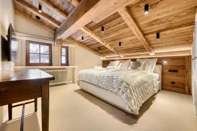 Ein Bett oder Betten in einem Zimmer der Unterkunft Chalet Lilly - Family and Friends by A-Appartments mit Ski in - Ski out