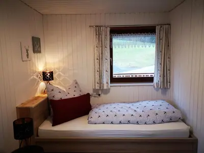 Ein Bett oder Betten in einem Zimmer der Unterkunft Erwin's