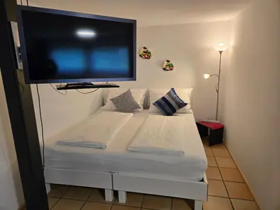 Ein Bett oder Betten in einem Zimmer der Unterkunft Studio Mario