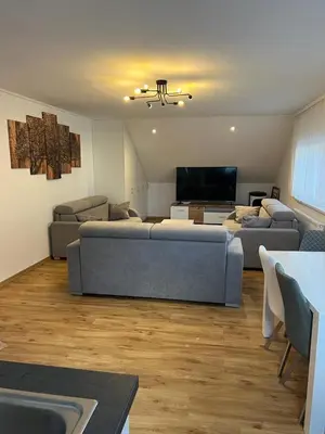Ein Sitzbereich in der Unterkunft Ferienwohnung Alpina