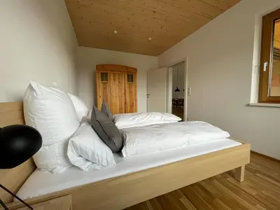 Ein Bett oder Betten in einem Zimmer der Unterkunft Gamsfels Josephine Galeriewohnung