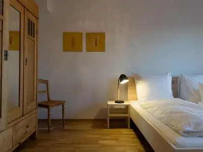 Ein Bett oder Betten in einem Zimmer der Unterkunft Gamsfels Josephine Galeriewohnung