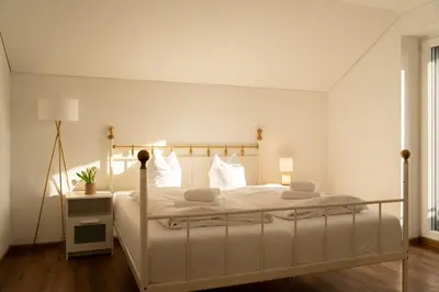 Ein Bett oder Betten in einem Zimmer der Unterkunft homy Central City Oasis in Dornbirn