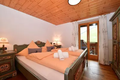Ein Bett oder Betten in einem Zimmer der Unterkunft Gästehaus Felder