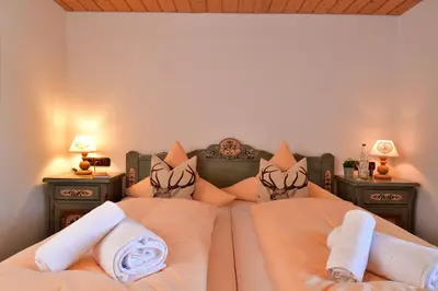 Ein Bett oder Betten in einem Zimmer der Unterkunft Gästehaus Felder