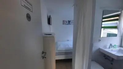 Ein Badezimmer in der Unterkunft Green Hill Rooms