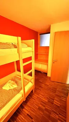 Ein Bett oder Betten in einem Zimmer der Unterkunft Ferienwohnungen 