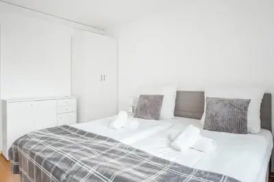Ein Bett oder Betten in einem Zimmer der Unterkunft Cocoon am Schloß