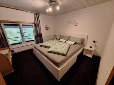 Ein Bett oder Betten in einem Zimmer der Unterkunft Vögelhof
