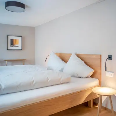 Ein Bett oder Betten in einem Zimmer der Unterkunft Gasthof Löwen Tosters