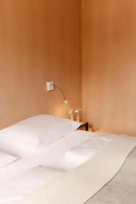 Ein Bett oder Betten in einem Zimmer der Unterkunft Hotel Post Bezau