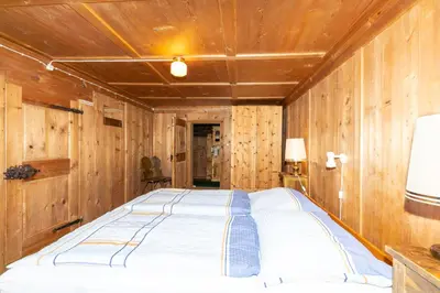 Ein Bett oder Betten in einem Zimmer der Unterkunft Haus Holzwurm