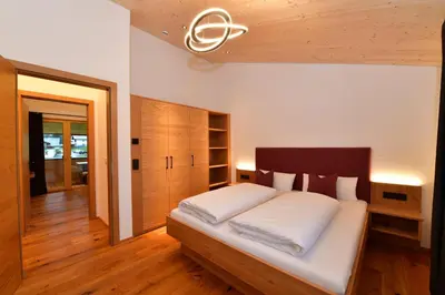 Ein Bett oder Betten in einem Zimmer der Unterkunft Straußberghof