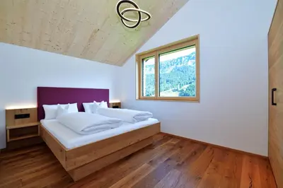 Ein Bett oder Betten in einem Zimmer der Unterkunft Straußberghof